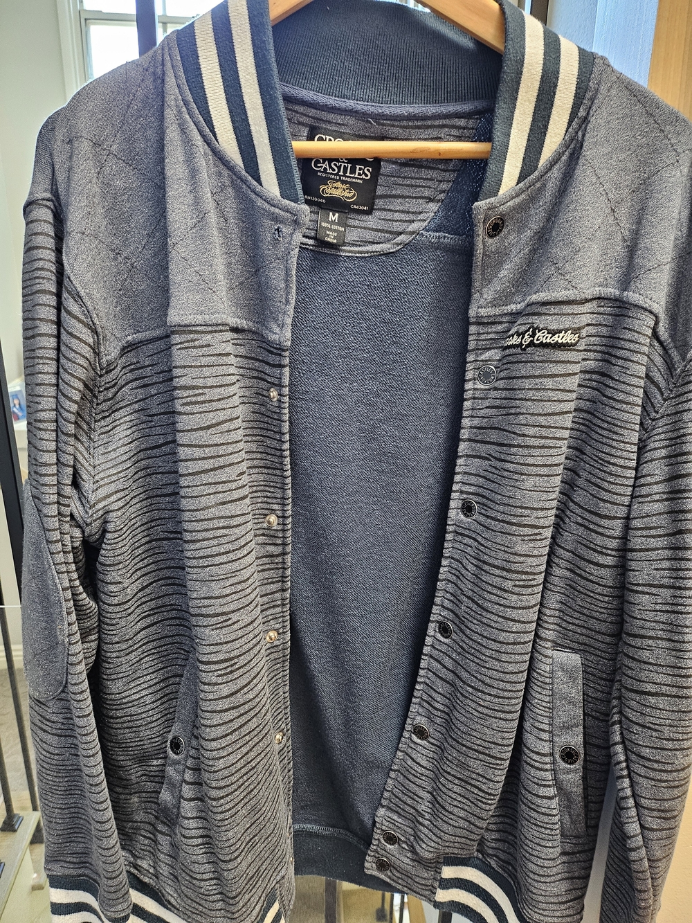 Castles Striped Snap-Up Bomber Jacket in Navy Size M.